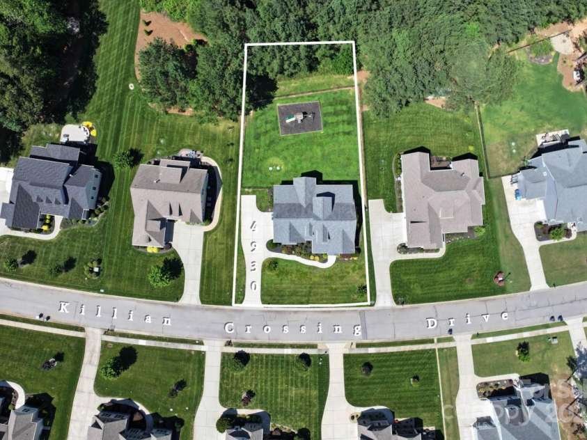 4930 Killian Crossing Drive, Denver, NC 28037.  MLS# CAR4277550, YatesRealty ID 28507. Aerial view of the home situated on the lot
