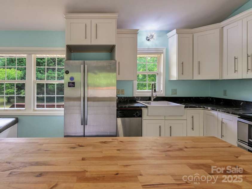 14 Spring Lake Drive, Fletcher, NC 28732.  MLS# CAR4270829, YatesRealty ID 28509. Lots of Natural Light
