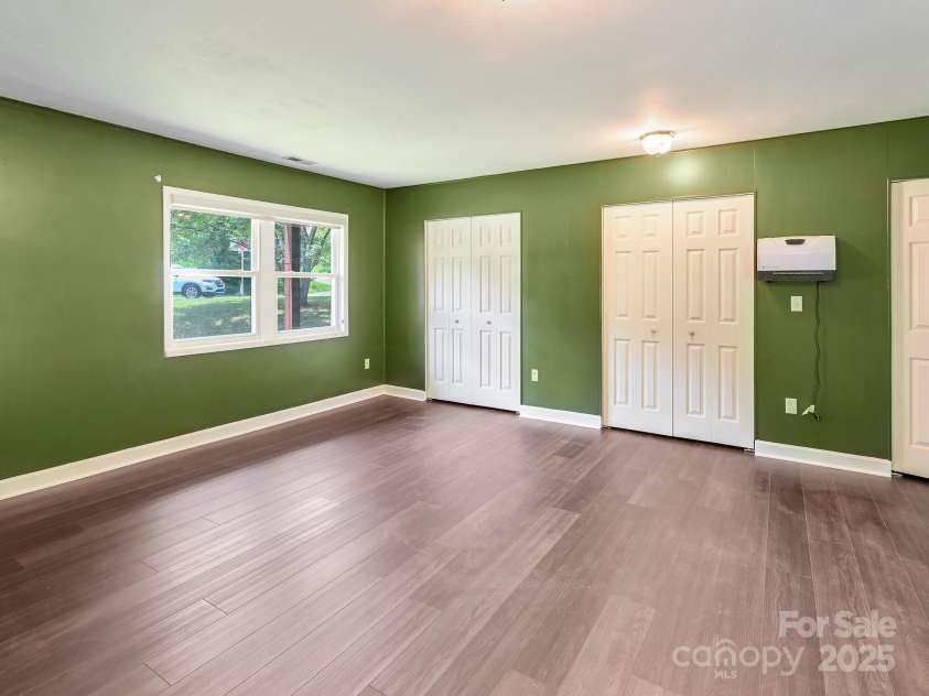 14 Spring Lake Drive, Fletcher, NC 28732.  MLS# CAR4270829, YatesRealty ID 28509. Spacious Lower Level Bonus Room