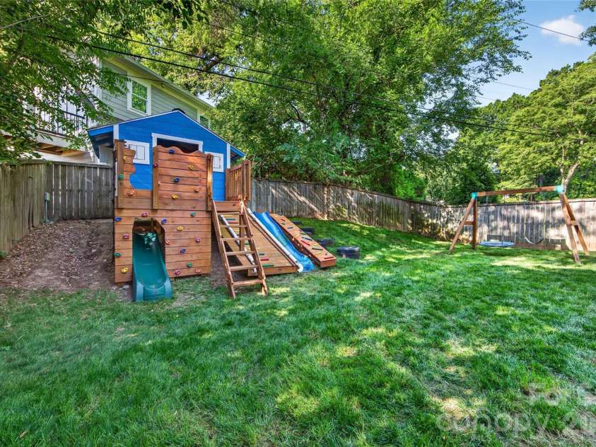 1624 Brook Road, Charlotte, NC 28205.  MLS# CAR4377757, YatesRealty ID 28509. Cool custom built playset  - built right into the yard!