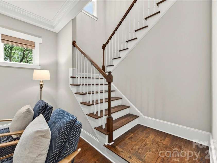 1624 Brook Road, Charlotte, NC 28205.  MLS# CAR4377757, YatesRealty ID 28509. Nice wide open wooden staircase