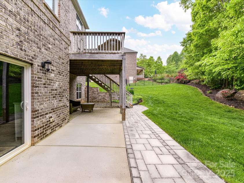 129 Overlook Ridge Lane, Davidson, NC 28036.  MLS# CAR4258840, YatesRealty ID 28510. Walk Out Basement Patio Area!