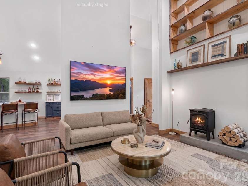 143 Eagles Avenue, Lake Lure, NC 28746.  MLS# CAR4381397, YatesRealty ID 28511. Virtually Staged living room