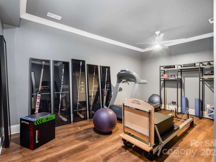 708 Amalfi Drive, Davidson, NC 28036.  MLS# CAR4281253, YatesRealty ID 28511. Lower level Exercise Room.
