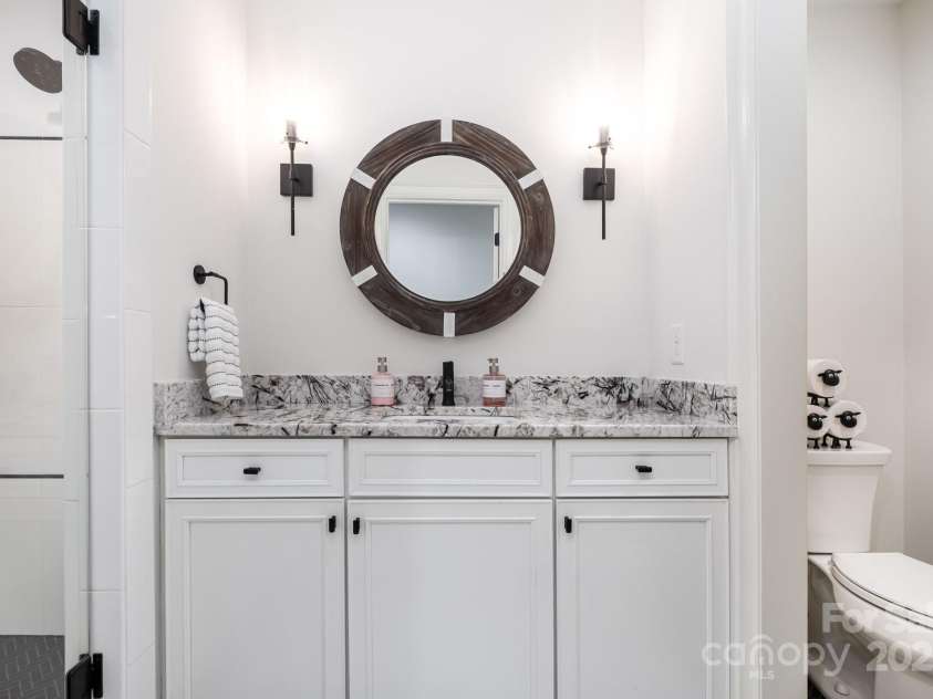 708 Amalfi Drive, Davidson, NC 28036.  MLS# CAR4281253, YatesRealty ID 28511. Lower level full bath