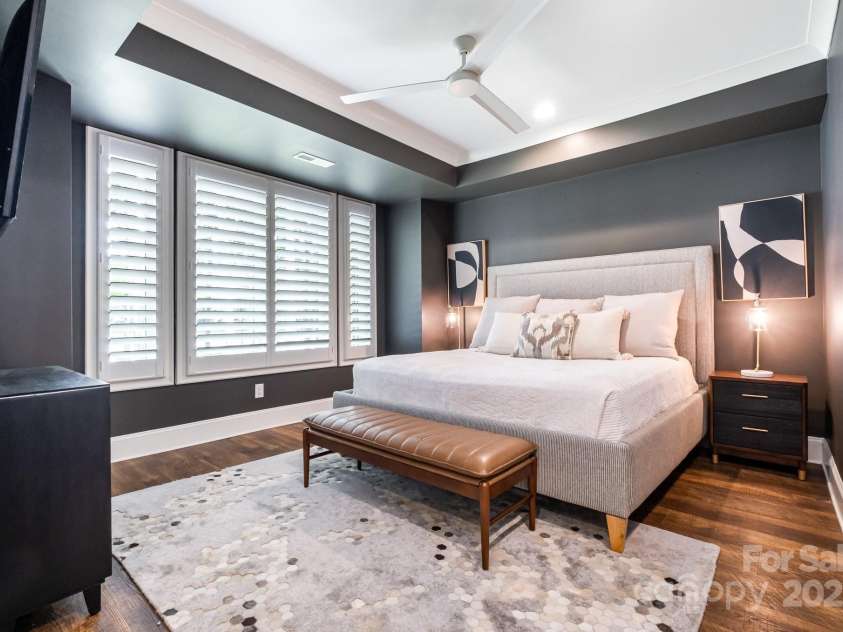 708 Amalfi Drive, Davidson, NC 28036.  MLS# CAR4281253, YatesRealty ID 28511. Lower level Guest Room wall of windows and lake views.