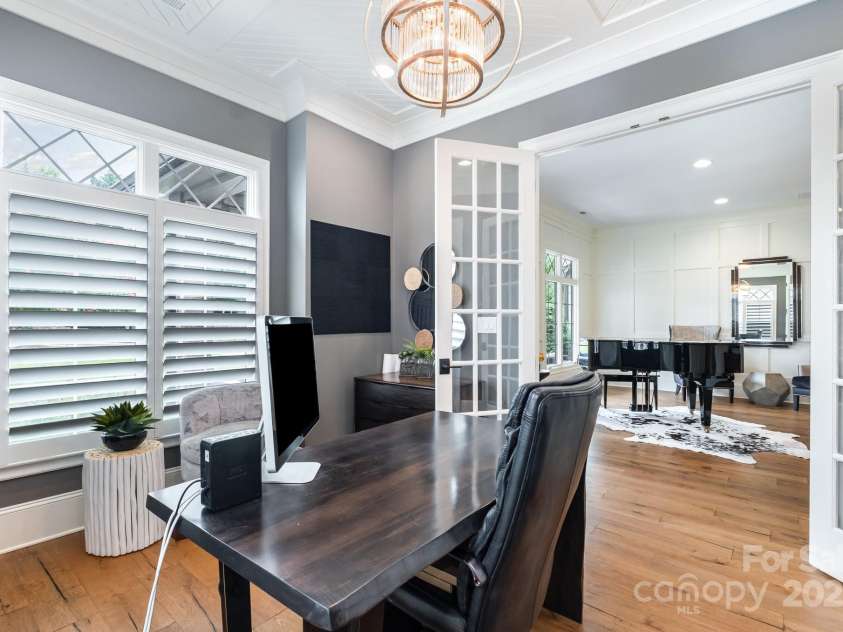 708 Amalfi Drive, Davidson, NC 28036.  MLS# CAR4281253, YatesRealty ID 28511. Main level office with diagonal inset beadboard tongue and groove ceiling.