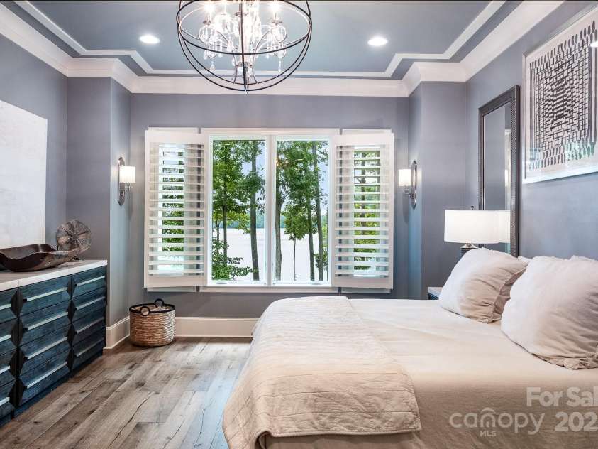 708 Amalfi Drive, Davidson, NC 28036.  MLS# CAR4281253, YatesRealty ID 28511. Primary Suite has beautiful lighting and water views