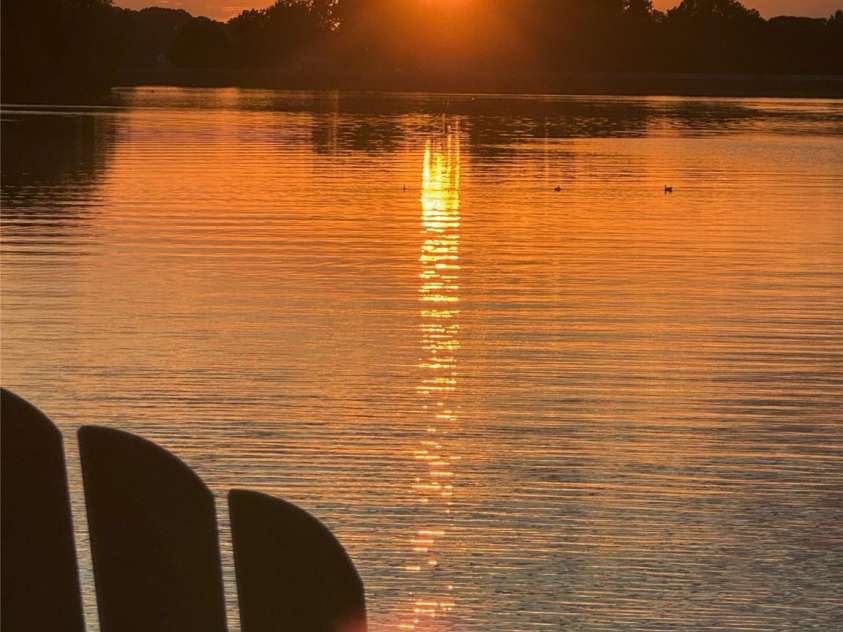 708 Amalfi Drive, Davidson, NC 28036.  MLS# CAR4281253, YatesRealty ID 28511. Summer sunset