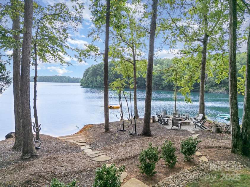 708 Amalfi Drive, Davidson, NC 28036.  MLS# CAR4281253, YatesRealty ID 28511. Waterfront area, fire pit and paddle sport launch area. Brilliant sunset views.