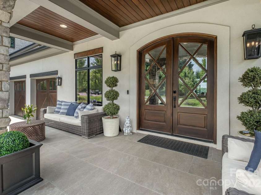 708 Amalfi Drive, Davidson, NC 28036.  MLS# CAR4281253, YatesRealty ID 28511. Welcoming front porch