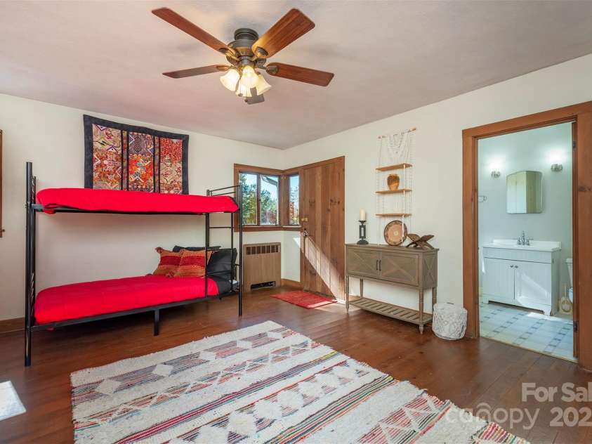 102 Weaver Mill Road, Columbus, NC 28722.  MLS# CAR4211548, YatesRealty ID 2852. Each downstairs bedroom has a door leading to the outside