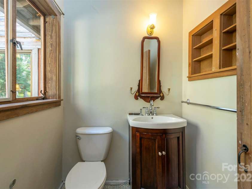 102 Weaver Mill Road, Columbus, NC 28722.  MLS# CAR4211548, YatesRealty ID 2852. Guest bathroom