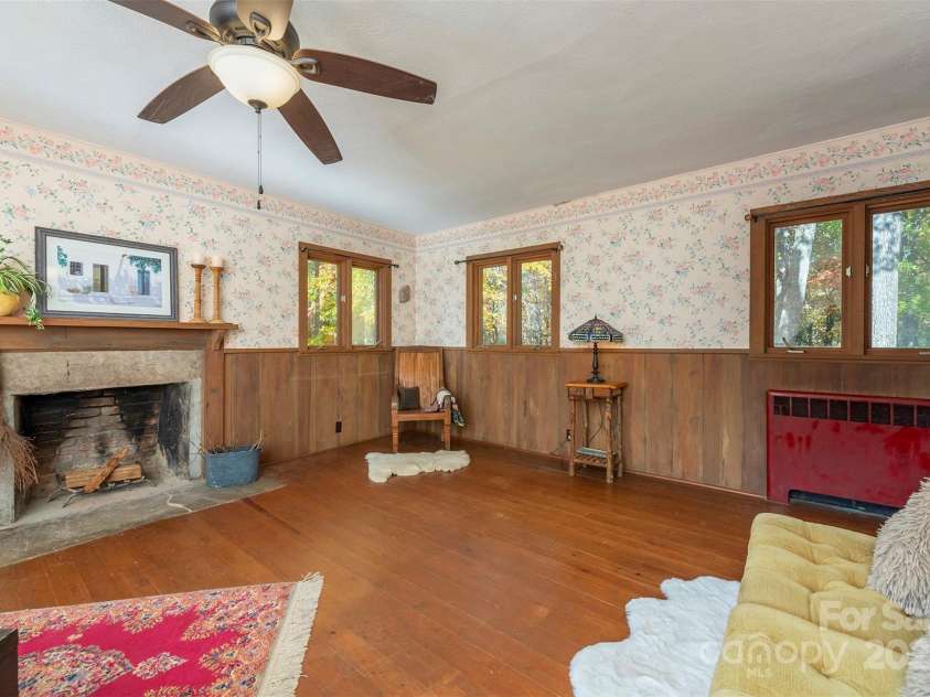 102 Weaver Mill Road, Columbus, NC 28722.  MLS# CAR4211548, YatesRealty ID 2852. The primary bedroom is both spacious and cozy