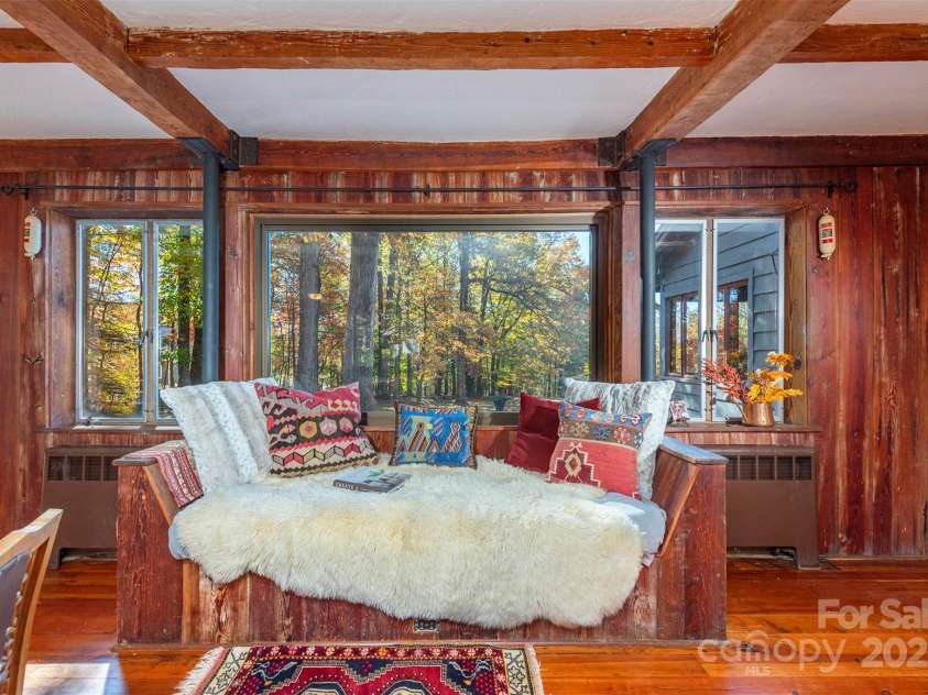 102 Weaver Mill Road, Columbus, NC 28722.  MLS# CAR4211548, YatesRealty ID 2852. This built in bench is the perfect spot to relax and take in the beauty of the outdoor setting