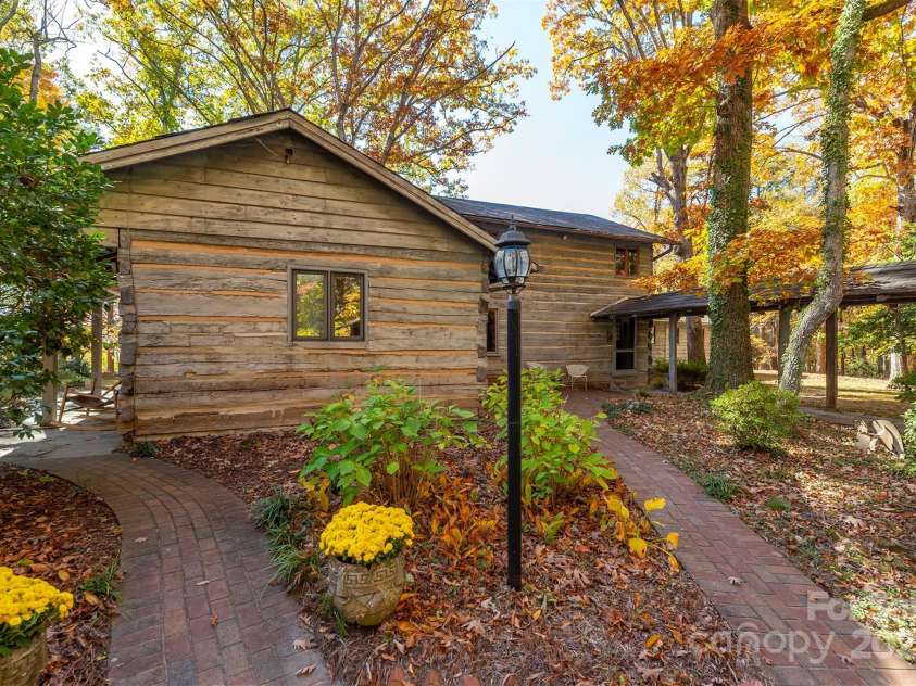 102 Weaver Mill Road, Columbus, NC 28722.  MLS# CAR4211548, YatesRealty ID 2852. Two exterior pathways lead to the kitchen