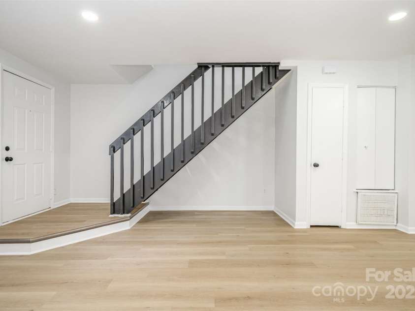 3941 Briarhill Drive, Charlotte, NC 28215.  MLS# CAR4268611, YatesRealty ID 28520. Beautiful custom staircase