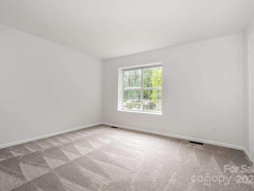 3941 Briarhill Drive, Charlotte, NC 28215.  MLS# CAR4268611, YatesRealty ID 28520. Bright primary bedroom