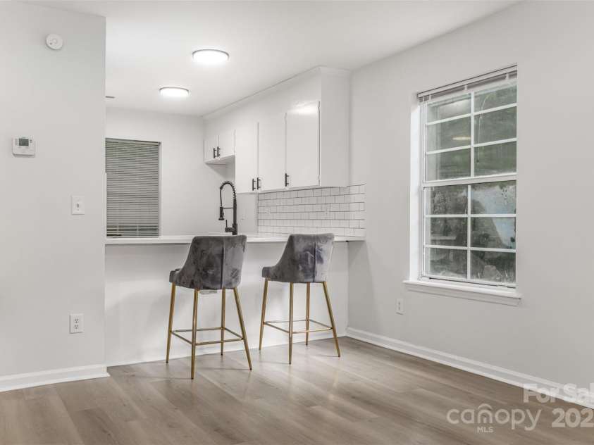 3941 Briarhill Drive, Charlotte, NC 28215.  MLS# CAR4268611, YatesRealty ID 28520. Kitchen Island (perfect for entertaining)