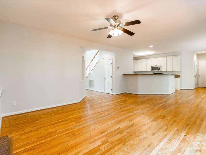 116 Doby Creek Court, Fort Mill, SC 29715.  MLS# CAR4314924, YatesRealty ID 28523. Living/Family Room w/ built ins connecting to open concept kitchen