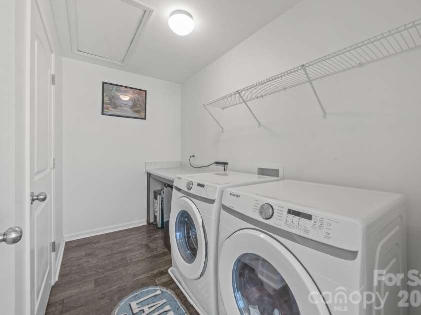 813 Yorkshire Drive, Albemarle, NC 28001.  MLS# CAR4390673, YatesRealty ID 28525. Laundry Room with closet and folding table