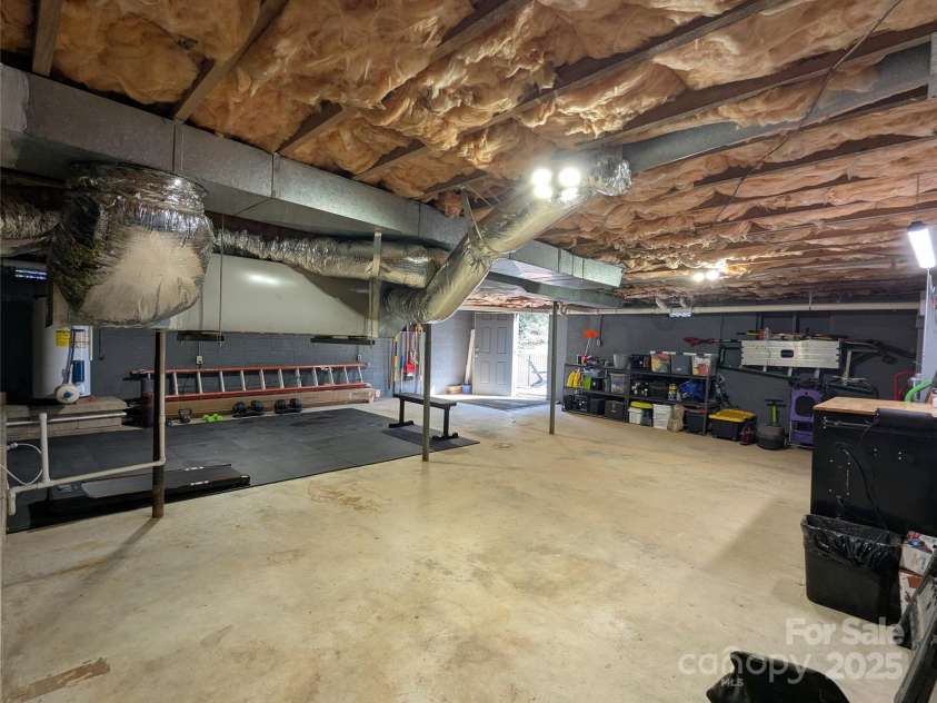 51 Miller Avenue, Marion, NC 28752.  MLS# CAR4221132, YatesRealty ID 2853. Basement Workshop