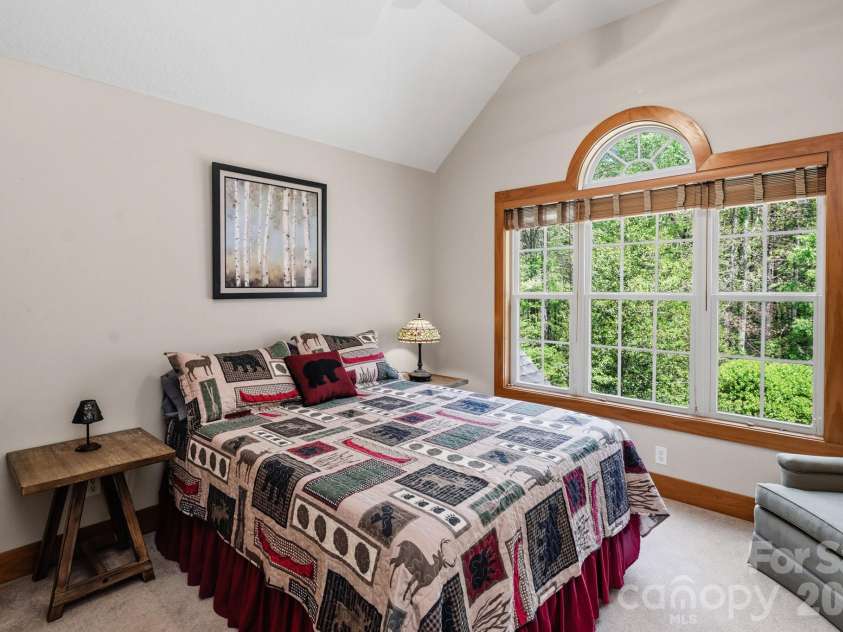 280 Bear River Lodge Trail, Marshall, NC 28753.  MLS# CAR4370579, YatesRealty ID 28530. Bedroom with Tree Top View