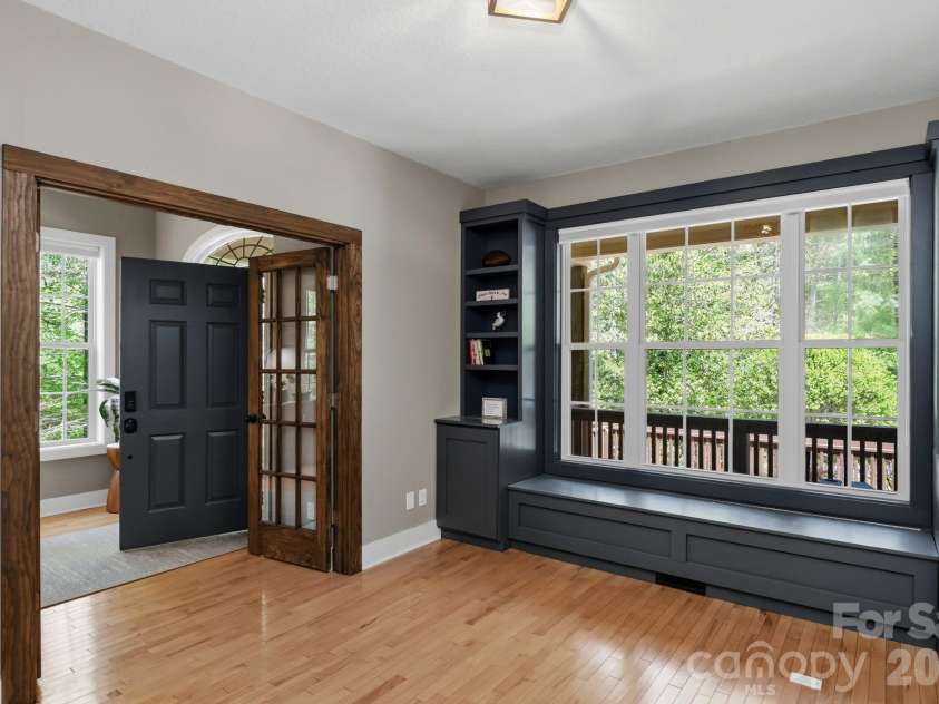 280 Bear River Lodge Trail, Marshall, NC 28753.  MLS# CAR4370579, YatesRealty ID 28530. Built-In Storage Bench and Shelving