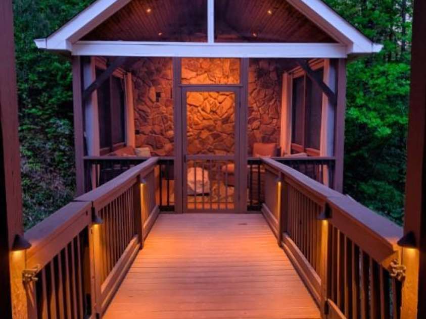 280 Bear River Lodge Trail, Marshall, NC 28753.  MLS# CAR4370579, YatesRealty ID 28530. Evening lighting accents