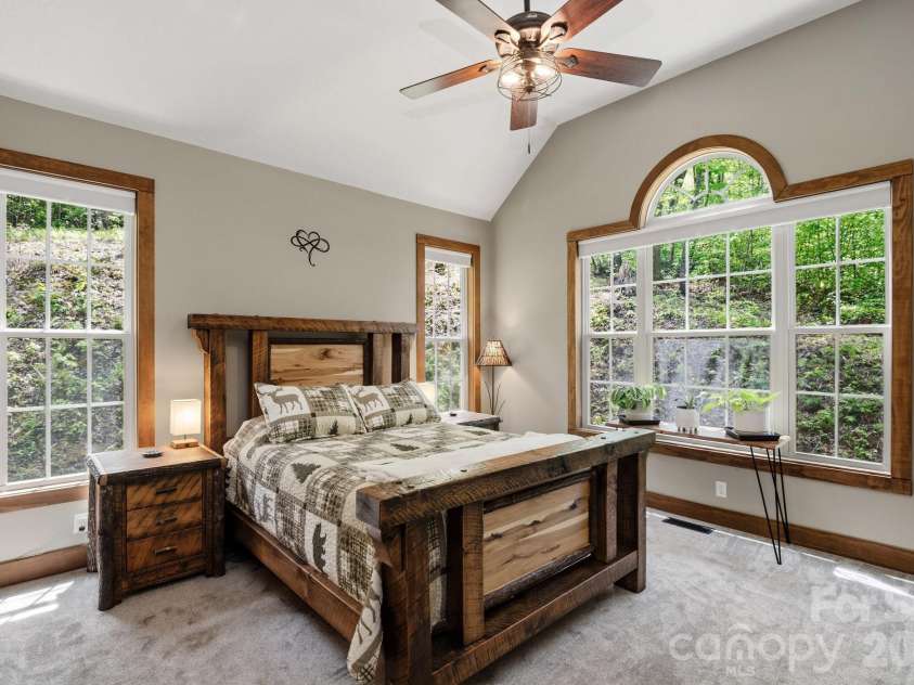 280 Bear River Lodge Trail, Marshall, NC 28753.  MLS# CAR4370579, YatesRealty ID 28530. Main-Level Primary Suite Features a Vaulted Ceiling