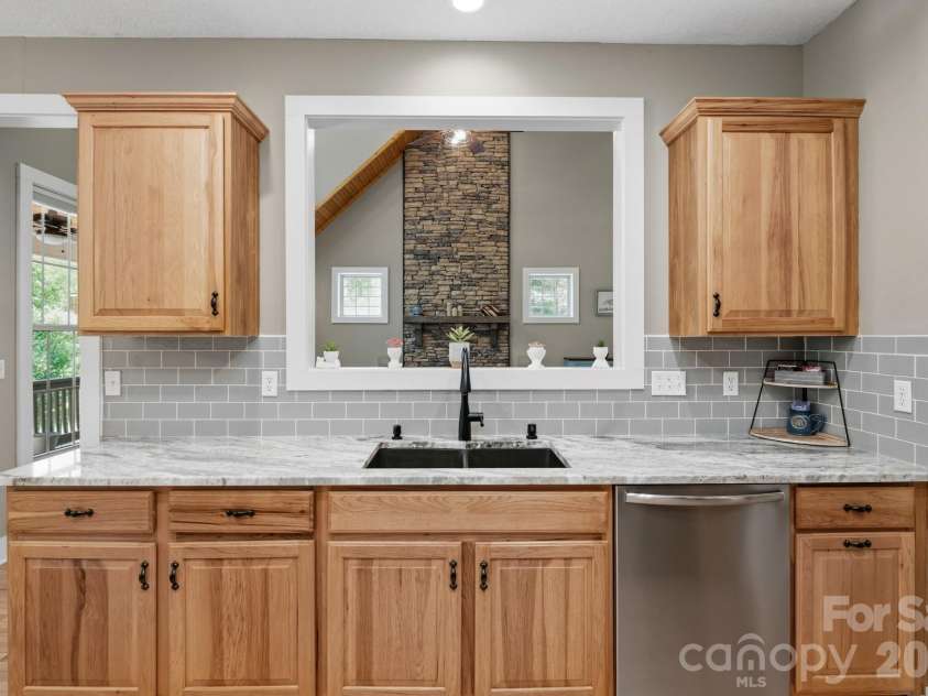 280 Bear River Lodge Trail, Marshall, NC 28753.  MLS# CAR4370579, YatesRealty ID 28530. Pass-Through Window Frames Living Area