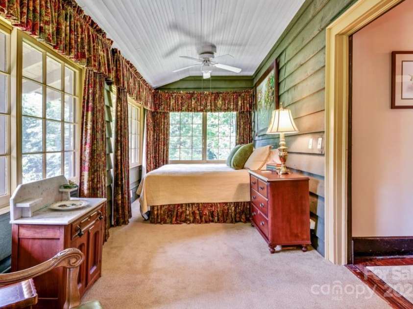 75 Charles Street, Saluda, NC 28773.  MLS# CAR4280162, YatesRealty ID 28531. Bedroom 4 The windows slide to open and have the original screens.  Making the ideal sleeper porch.