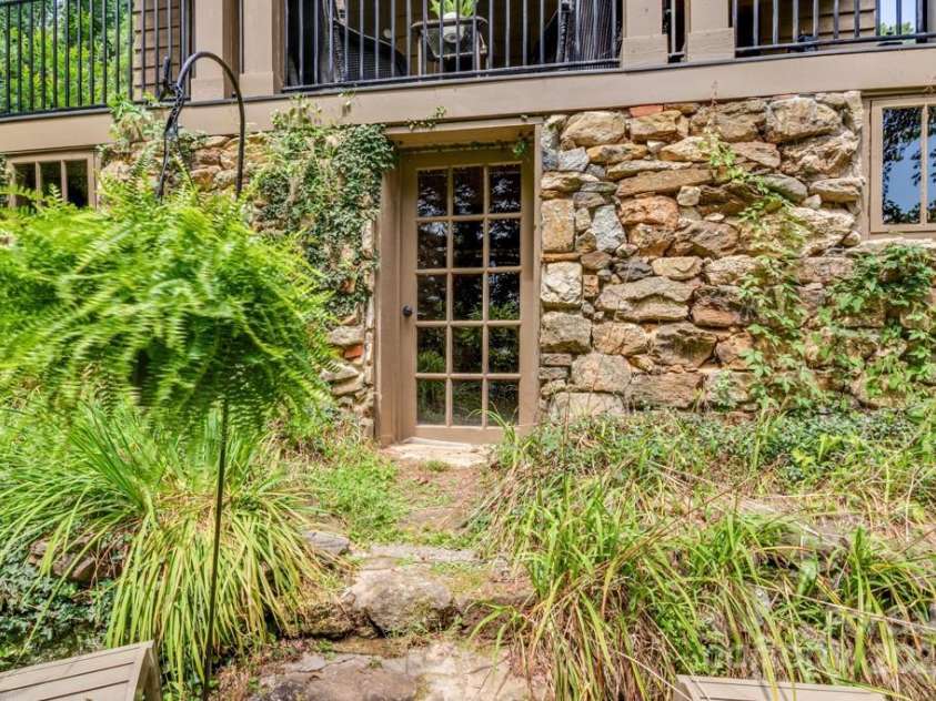75 Charles Street, Saluda, NC 28773.  MLS# CAR4280162, YatesRealty ID 28531. Walk up entry to basement
