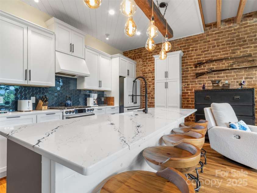 5 Town Square, Burnsville, NC 28714.  MLS# CAR4284216, YatesRealty ID 28535. Kitchen with Cambria Inverness Cobalt Quartz