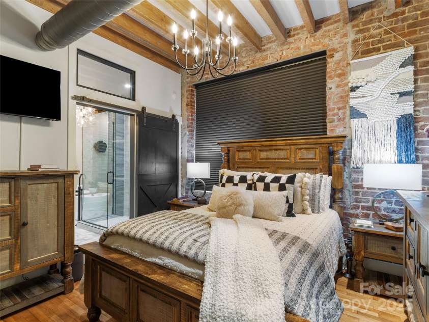 5 Town Square, Burnsville, NC 28714.  MLS# CAR4284216, YatesRealty ID 28535. Primary Bedroom