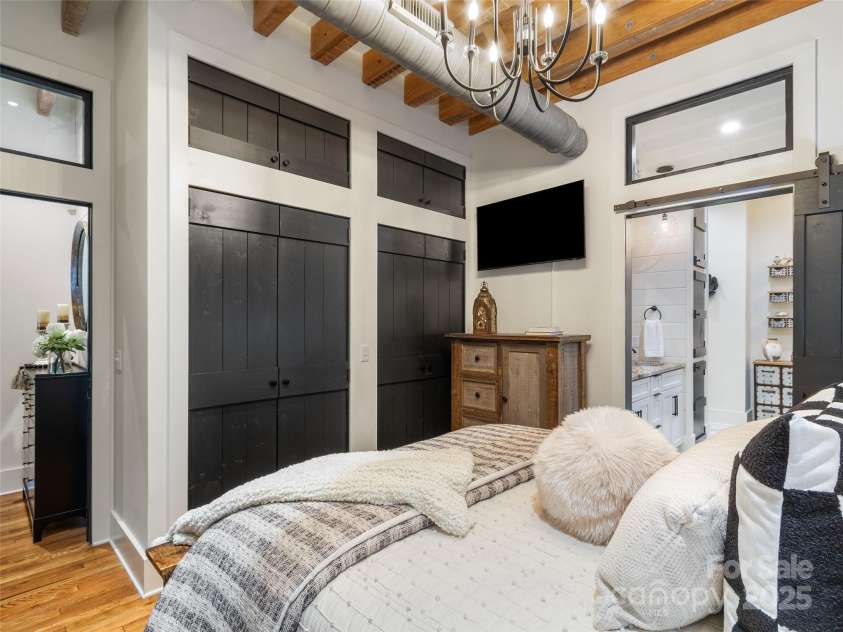 5 Town Square, Burnsville, NC 28714.  MLS# CAR4284216, YatesRealty ID 28535. Primary Bedroom