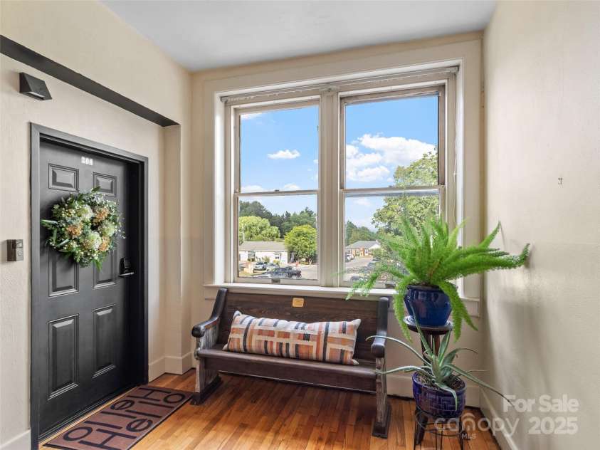 5 Town Square, Burnsville, NC 28714.  MLS# CAR4284216, YatesRealty ID 28535. Unit 204 Entrance