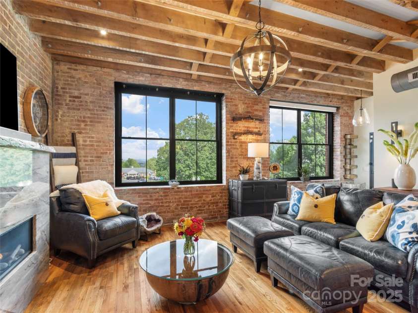 5 Town Square, Burnsville, NC 28714.  MLS# CAR4284216, YatesRealty ID 28535. Welcome to Unit 204 - Parnell on Town Square