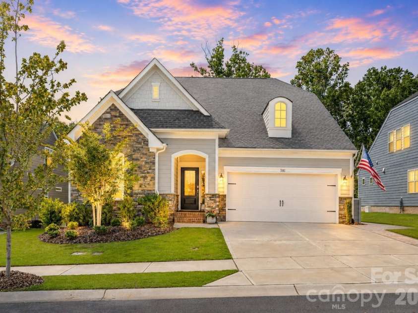 3141 Deep River Way, Waxhaw, NC 28173.  MLS# CAR4384058, YatesRealty ID 28537. Sky and uplighting is AI generated