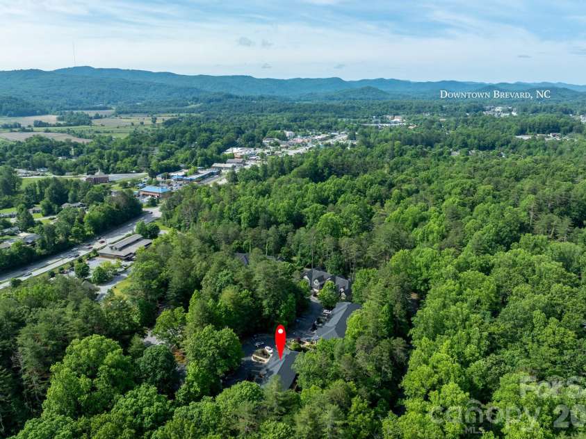 99 Ridgetop Circle, Brevard, NC 28712.  MLS# CAR4387560, YatesRealty ID 28540. Convenient Access to Downtown Brevard – Ideally located just minutes from vibrant downtown Brevard, offering easy access to restaurants, shopping, galleries, and entertainment.