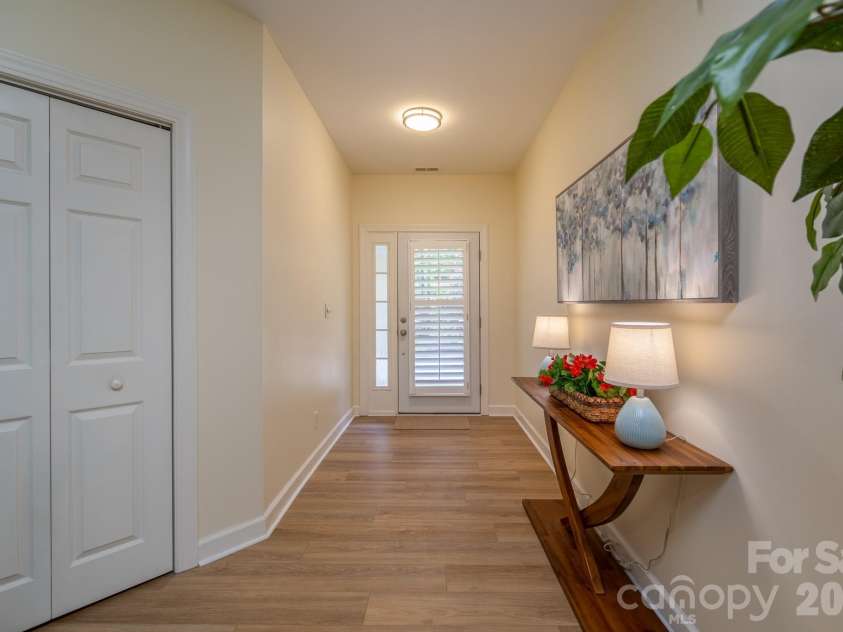 99 Ridgetop Circle, Brevard, NC 28712.  MLS# CAR4387560, YatesRealty ID 28540. Spacious Foyer Entry – Bright and welcoming foyer with updated flooring and a clean, open design creating a warm first impression upon entry.