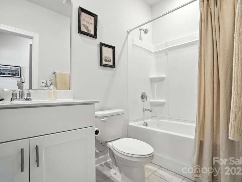3140 Seville Street, Charlotte, NC 28214.  MLS# CAR4285079, YatesRealty ID 28543. A well-placed full bath on the main level shared with the two large bedrooms