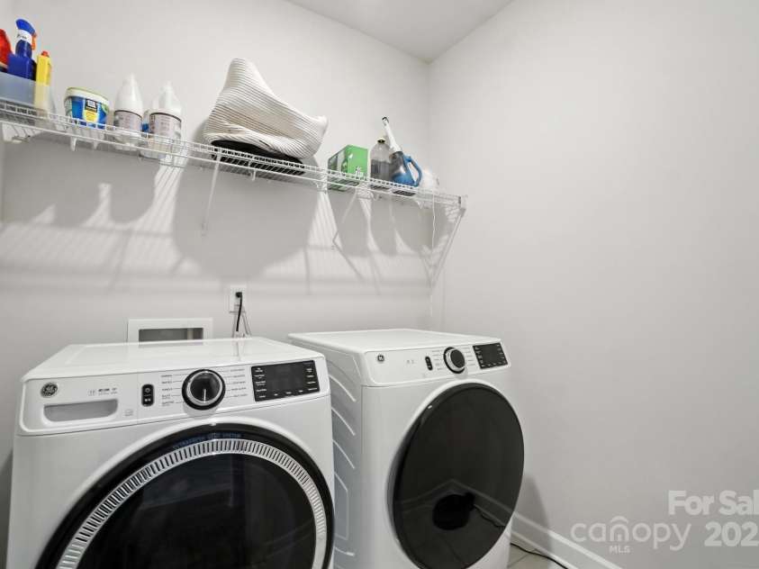 3140 Seville Street, Charlotte, NC 28214.  MLS# CAR4285079, YatesRealty ID 28543. Laundry room with modern washer and dryer included
