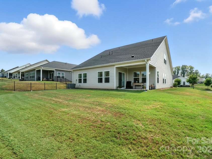 3140 Seville Street, Charlotte, NC 28214.  MLS# CAR4285079, YatesRealty ID 28543. Spacious, level backyard with no homes behind for added privacy
