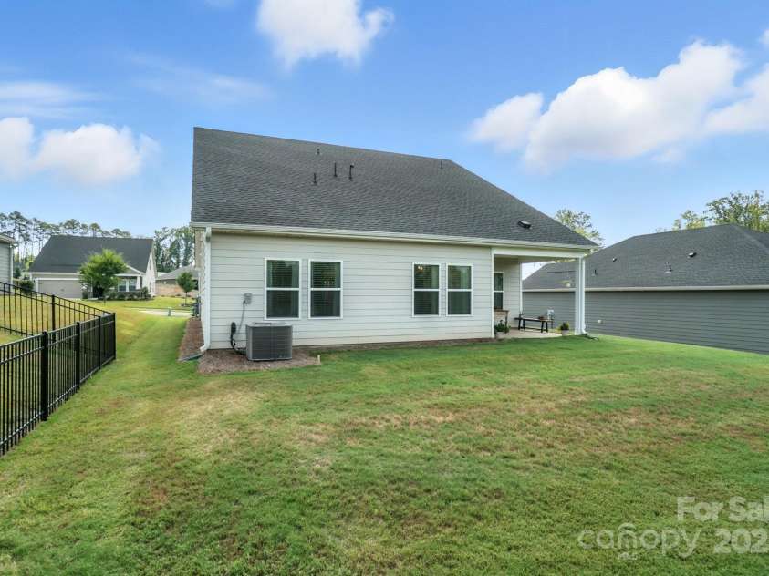 3140 Seville Street, Charlotte, NC 28214.  MLS# CAR4285079, YatesRealty ID 28543. Spacious, level backyard with no homes behind for added privacy