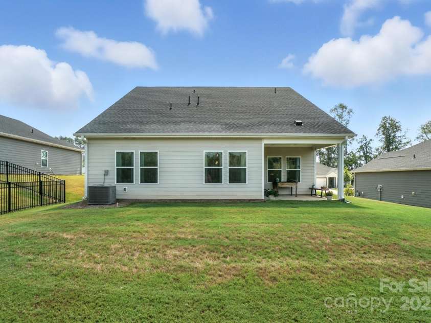 3140 Seville Street, Charlotte, NC 28214.  MLS# CAR4285079, YatesRealty ID 28543. Spacious, level backyard with no homes behind for added privacy