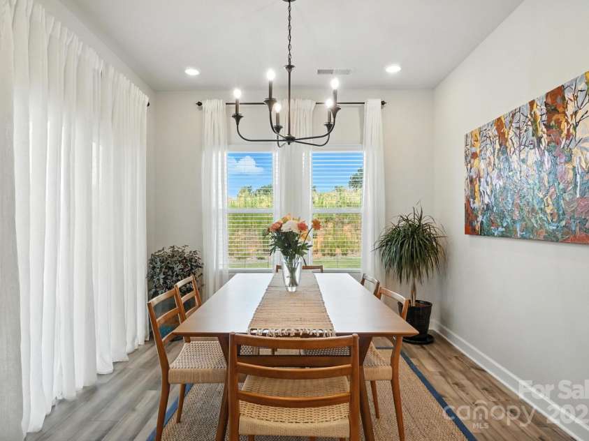 3140 Seville Street, Charlotte, NC 28214.  MLS# CAR4285079, YatesRealty ID 28543. Sun-filled dining area with backyard views
