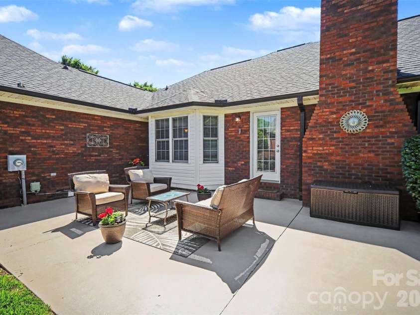 9903 Madres Court, Concord, NC 28027.  MLS# CAR4380486, YatesRealty ID 28544. Back patio