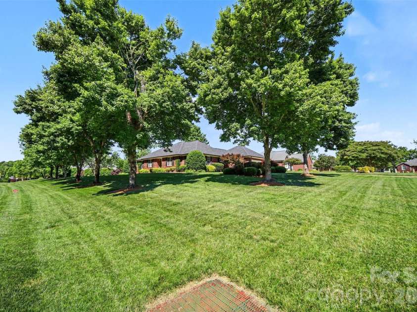 9903 Madres Court, Concord, NC 28027.  MLS# CAR4380486, YatesRealty ID 28544. Front yard