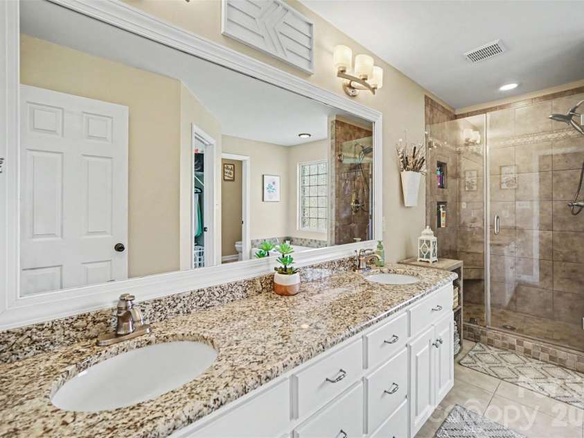 9903 Madres Court, Concord, NC 28027.  MLS# CAR4380486, YatesRealty ID 28544. Primary bath